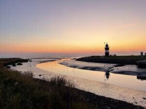 Wremen lighthouse at dusk by Norbert Schepers